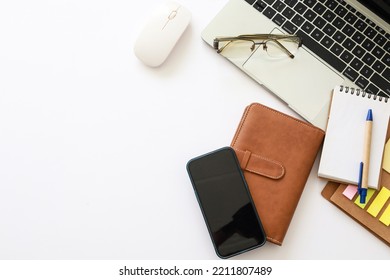 Overhead Shot Computer Laptop, Smart Phone, Note Pad ,diary On White Background