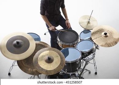 Overhead Shot Of Drummer Playing Drum Kit In Studio