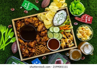 Overhead Shot Of Football Game Day Tailgate Party Food And Snack