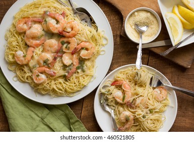 Overhead Shot Of Fresh Shrimp Scampi With Pasta Being Served. 