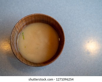 Overhead Shot Of Miso Soup In A Wooden Sipping Bowl