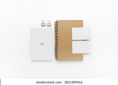 An Overhead Shot Of Notebook And Stationery Products Solated On A White Background