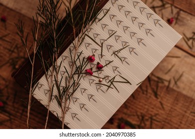 An Overhead Shot Of An Old Book In A Vintage Setting