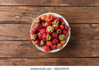 Overhead Shot Of Organic Strawberries In Bowl