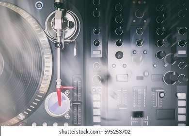 Overhead Shot Of Party Dj Audio Equipment.Turn Table Top View,sound Mixer And Vinyl Record With Music.Over Head Shot.Double Exposure