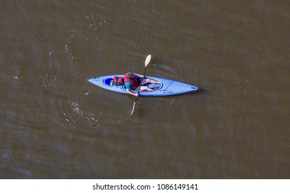 Overhead Shot Of People In Kayaks On River