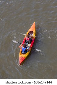 Overhead Shot Of People In Kayaks On River