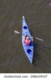 Overhead Shot Of People In Kayaks On River