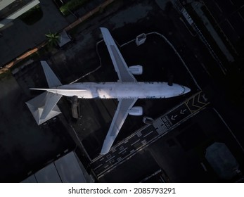 Overhead Shot Of Plane In The City