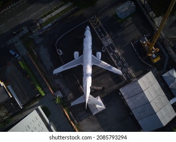 Overhead Shot Of Plane In The City