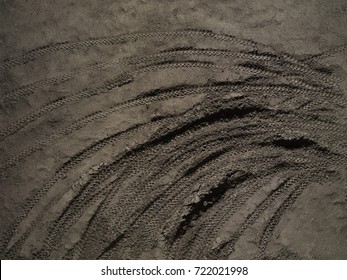 Overhead Shot Of Vehicle Tracks On Dirt