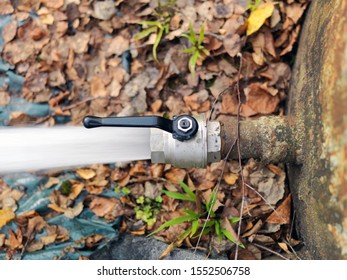 Overhead Shot Of A Water Flowing Out Of The Open Valve, Outdoor Image