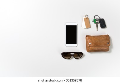 overhead shot of woman stuff isolated on white background with space on the left