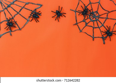 Overhead Of Sign Happy Halloween Festival Background Concept.Top Of Essential Object On The Modern Rustic Orange Table Wood With Home Decoration.Necessary Items For Ornament The Season.