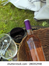 Overhead vertical shot with selective focus of a pink wine bottle