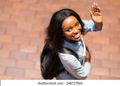 Overhead View Of African American Student Waving Goodbye