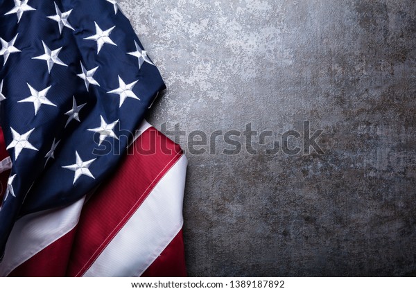 An Overhead View Of American Flag On Dark\
Concrete Background