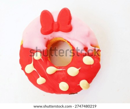An overhead view of assorted donuts. fresh donuts in multi-colored glaze chocolate, colorful donuts,sweet colored donuts, Strawberry frosted vanilla coating isolate on a white backdrop, Text space image