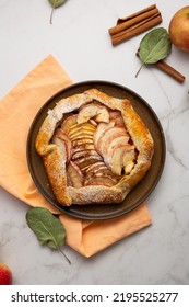 Overhead View Of Autumn Apple Pie Crust Galette  On Marble