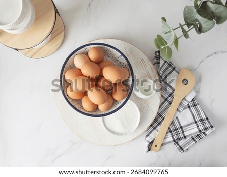 Overhead view of baking items on clean kitchen countertop