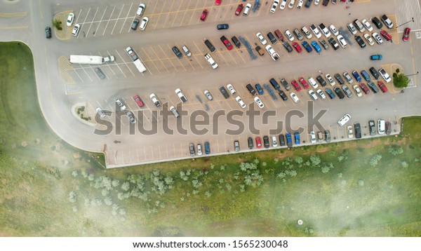 Overhead view of big car\
parking.
