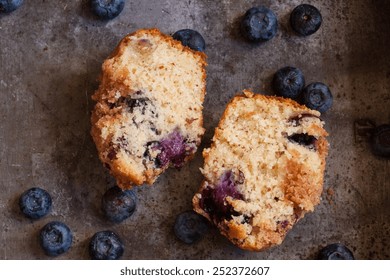 Overhead View Of Blueberry Muffin On Rustic Background