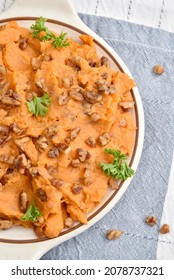 Overhead View Of A Bowl Of Fresh Homemade Sweet Potatoes With Glazed Pecans