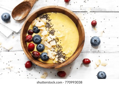 Overhead View Of Breakfast Mango Smoothie Bowl / Healthy Eating Concep