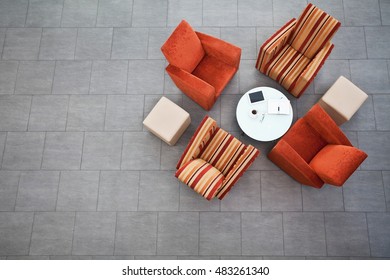 Overhead View Of Business Armchairs In Office Atrium