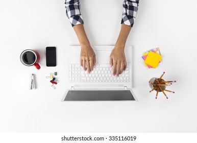 Overhead View Of Businesswoman Working At Computer In Office - Shutterstock ID 335116019