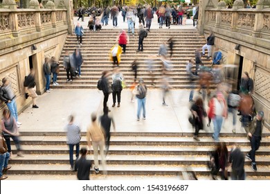 Overhead View Of Busy Crowds Of People Walking Up And Down The Steps At Bethesda Terrace In Central Park, New York City NYC