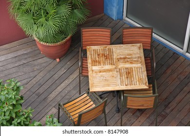 Overhead View Of Casual Dining Restaurant With Wooden Table And Chairs