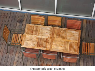 Overhead View Of Casual Dining Restaurant With Wooden Table And Chairs