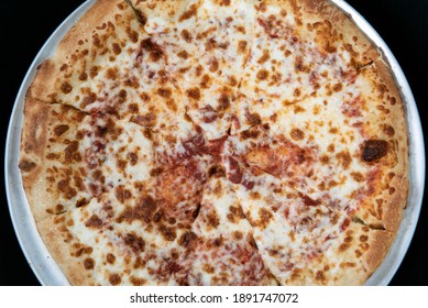 Overhead View Of Cheese Pizza For That Plain Flavor That Many Picky Eaters Prefer.