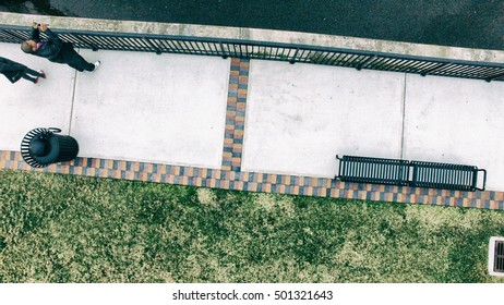 Overhead View Of City Garden And Bench.