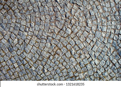 Overhead View Of Cobblestone Street Texture. Stone Pavement Texture