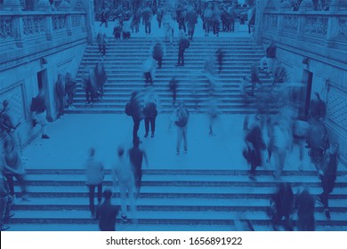 Overhead View Of Crowds Of People On Steps In Central Park New York City With Blue Color Effect