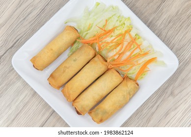 Overhead View Of Deep Fried Egg Rolls Arranged On A Plate As An Appetizer For Your Meal.