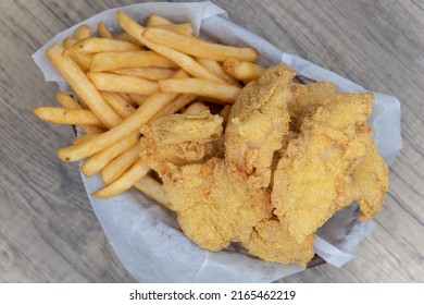 Overhead View Of Delicious Basket Of Fried Fish And Chips For A Tasty Fastfood Seafood Meal.