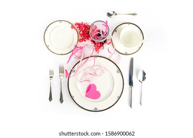 Overhead View Of A Fine China Place Setting For Valentines Dinner Isolated On White