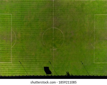 An Overhead View Of A Football Soccer Pitch With White Markings Painted On Grass.