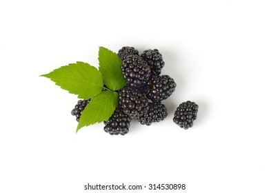 Overhead View Of Fresh Blackberries Decorated With Green Leaves