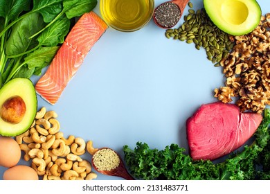 Overhead View Of Fresh Omega-3 Rich Foods: A Variety Of Healthy Foods Like Fish, Nuts, Seeds, Fruit, Vegetables, And Oil Rich In Omega-3 Nutrients