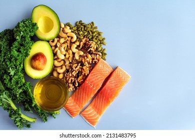 Overhead View Of Fresh Omega-3 Rich Foods: A Variety Of Healthy Foods Like Fish, Nuts, Seeds, Fruit, Vegetables, And Oil Rich In Omega-3 Nutrients