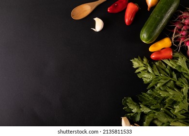 Overhead View Of Fresh Vegetables And Ingredients On Black Background, Copy Space. Unaltered, Food, Studio Shot, Healthy Eating, Organic.