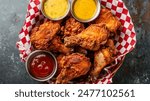 Overhead View of Fried Chicken in a Basket for your background bussines, poster, wallpaper, banner, greeting cards, and advertising for business entities or brands.