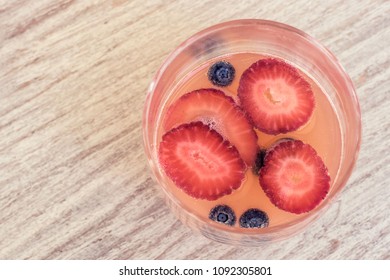 Overhead View Of A Glass Of Berry Mimosa