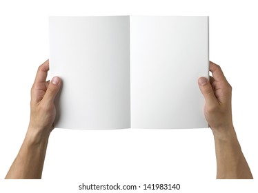 overhead view of hands holding a blank book ready with copy space ready for text, isolated on white, with clipping path