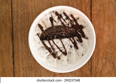 Overhead View Of  Homemade Butter Cookie Italian Ice Cream Tub On Wooden Background