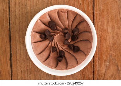 Overhead View Of  Homemade Chocolate Chip Italian Ice Cream Tub On Wooden Background